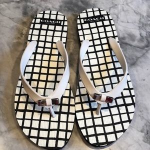 NIB coach flip flops. Size 9M